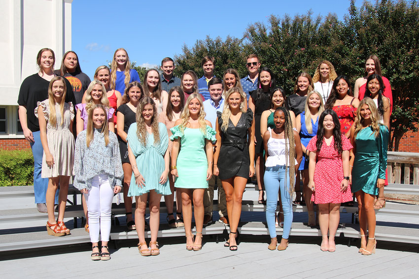 These East Central Community College students were inducted into Theta Xi chapter of Phi Theta Kappa Honor Society during ceremonies on campus Sept. 22. PTK is the international honor society of two-year colleges. Students participating in the Fall 2021 induction ceremony and their hometowns include (front row, from left) Hannah Grace Horton of Forest, Emily Loe of Brandon, Piper Fulton of Philadelphia, Mabry Mayfield of Carthage, Destiny Brown of Lena, Kristen Wilcher of Carthage, and Brayleigh Gregory of Louisville; (second row, from left) Kaitlyn Wilson of Sebastopol, Mary Ellen Booker of Philadelphia, Sasha Clare of Belfast, Northern Ireland, Annabelle Hudson of Louisville, William Page of Philadelphia, Citlali Hernandez Lopez of Forest, and Alexis Guthrie of Forest; (third row, from left) Emma Taylor of Philadelphia, Dempsie McDill of Forest, Hannah Kreuz of Forest, Madison Graham of Philadelphia, Anslee Boyd of Pelahatchie, Carson Wofford of Pelahatchie, Jocey Bell of Forest, Ninel Ramirez of Carthage, and Kim Salvador of Carthage; and (back row, from left) Corey Eakes of Philadelphia, Eden Smith of Quitman, Sam Hankins of Nanih Waiya, Lucas Foley of Hickory, Zebariaha Spire of Philadelphia, Caitlyn Wilson of Philadelphia, and Khloe Elyse Cockerham of Union. Nearly 70 students joined the prestigious organization this semester. To qualify, students must have completed at least 12 hours of coursework that may be applied to an associate degree and must have a grade-point average of 3.5 or higher.